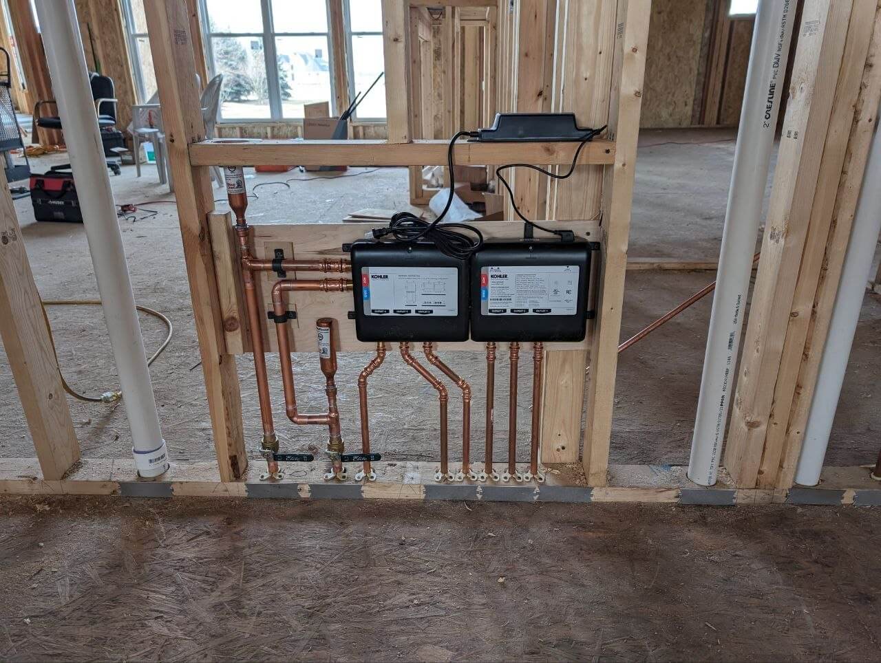 Copper water distribution manifold installed during new home construction