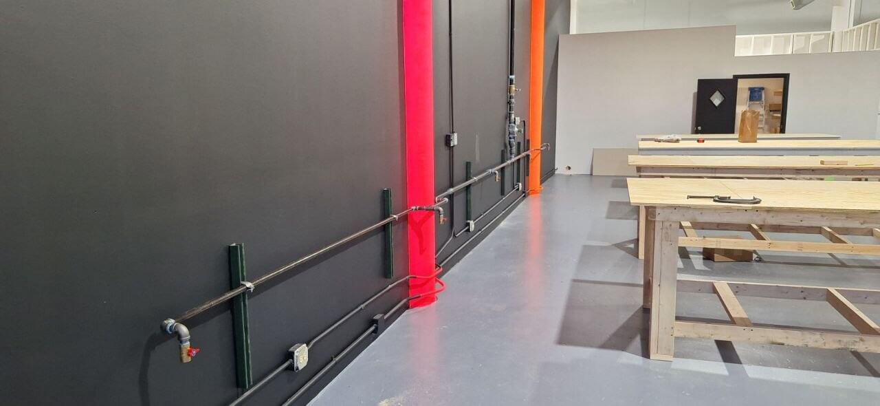Gas piping installed in a commercial workshop space
