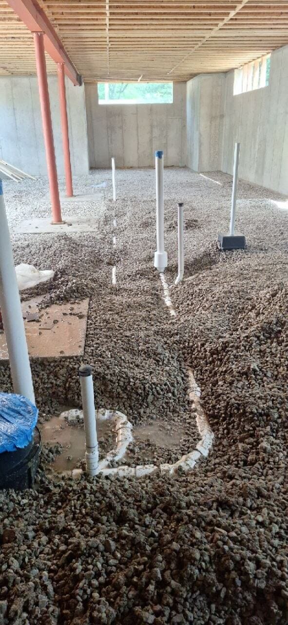Under-slab plumbing rough-in for new construction